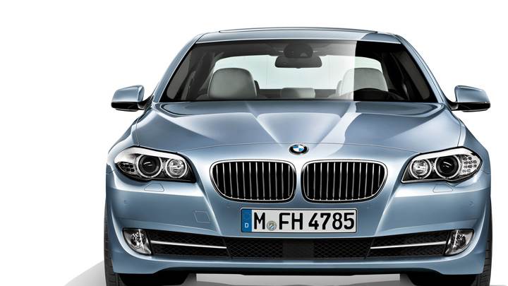Front Pose of 2012 BMW ActiveHybrid 5 In Blue